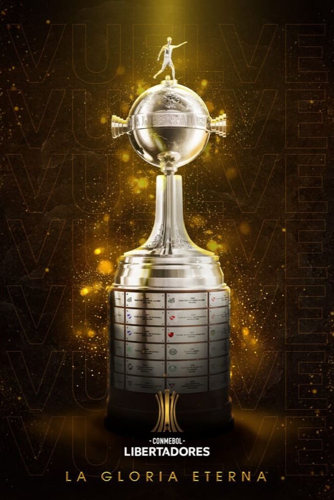 A glowing silver Copa Libertadores trophy stands on a dark background with golden light and the word VUELVE repeated. Text below reads: CONMEBOL LIBERTADORES - LA GLORIA ETERNA. Watch every match live with IPTV Latino.